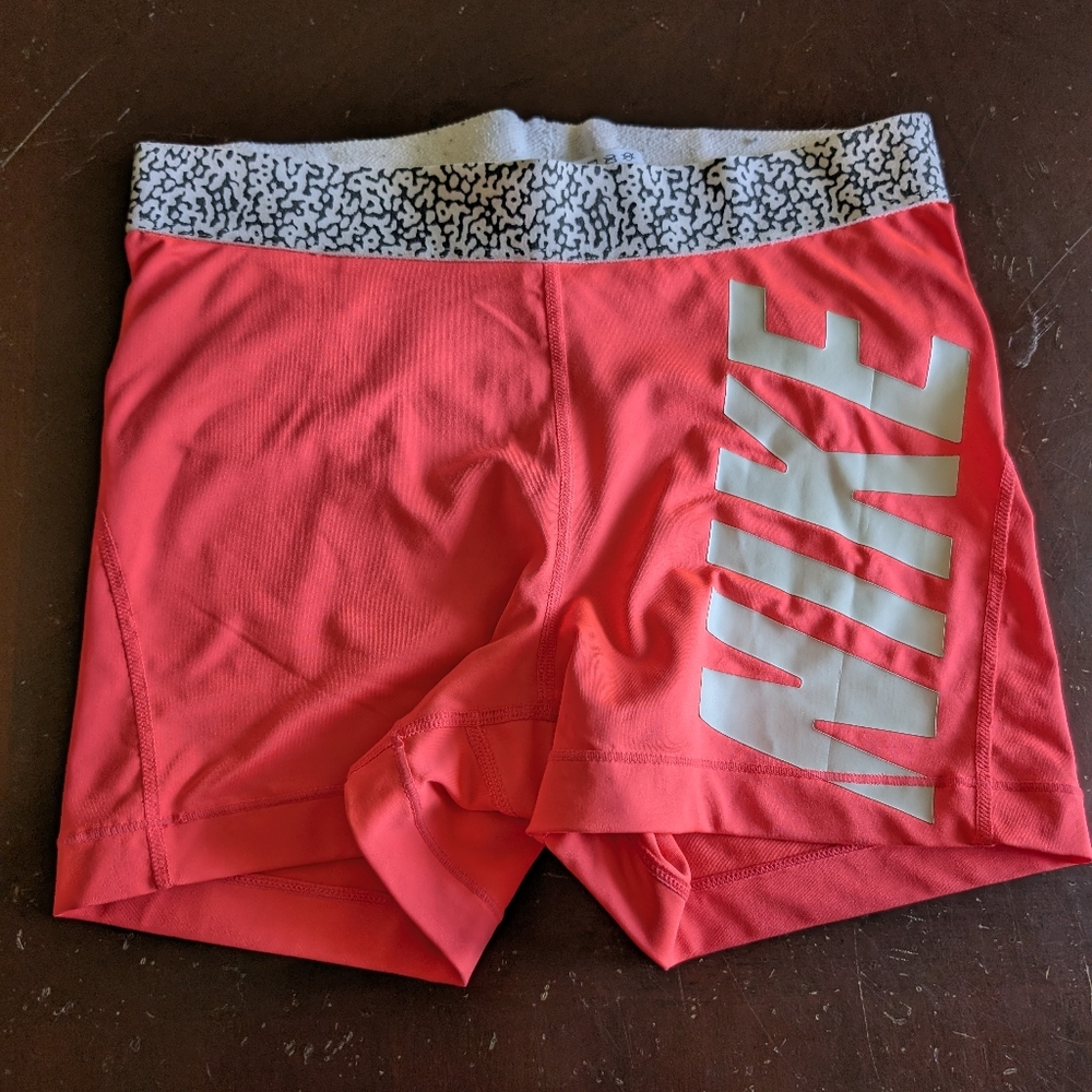 Nike Women's Athletic Shorts in Pink and White